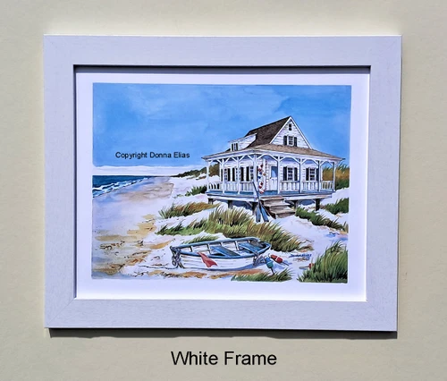 Beach Cottage and Boat in a white frame - copyright Donna Elias