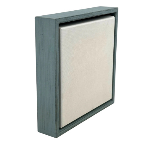 A weathered light blue floater frame designed for 1.5" deep canvases, showcasing coastal texture, clean lines, modern spacing, and a stylish gallery-ready finish for artwork display.