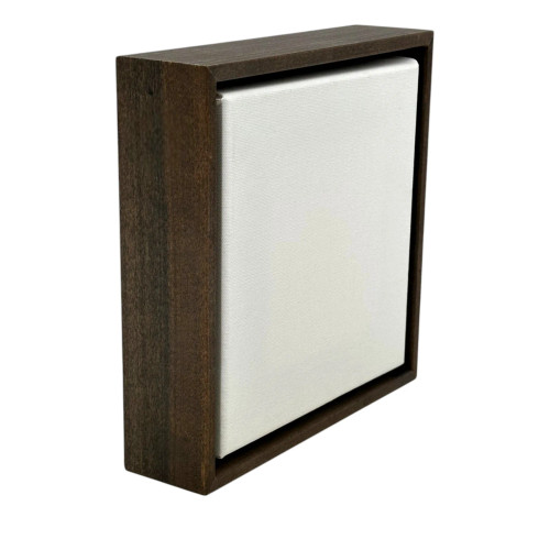 Warm walnut-stained floater frame designed for 1.5" deep canvases. Clean edges and modern profile enhance artwork with a rich, natural gallery-style presentation.