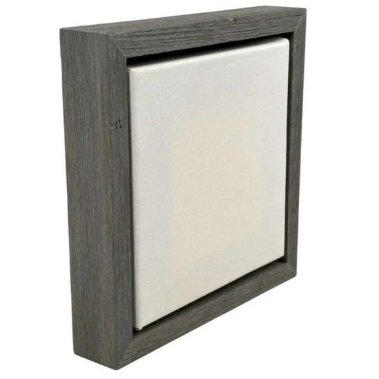 Weathered Gray Floater Frame shown with a 1.5" deep canvas, featuring a rustic gray wood grain finish that adds texture and a contemporary gallery-style look.