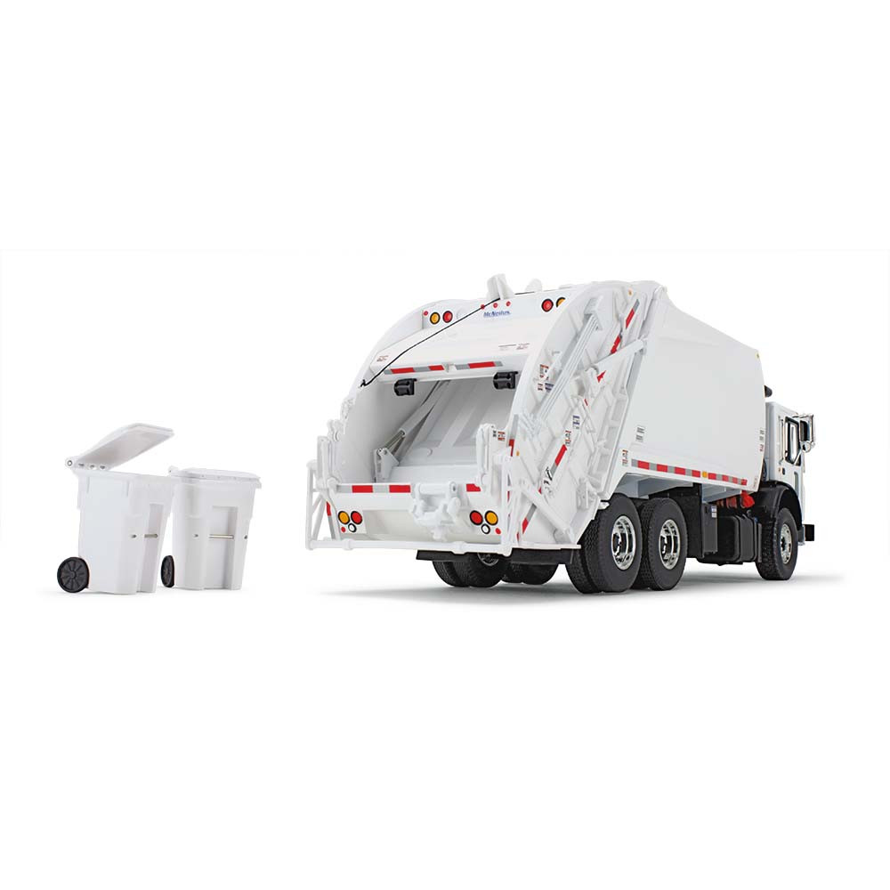 White Mack TerraPro with McNeilus Rear Loader & Trash Carts