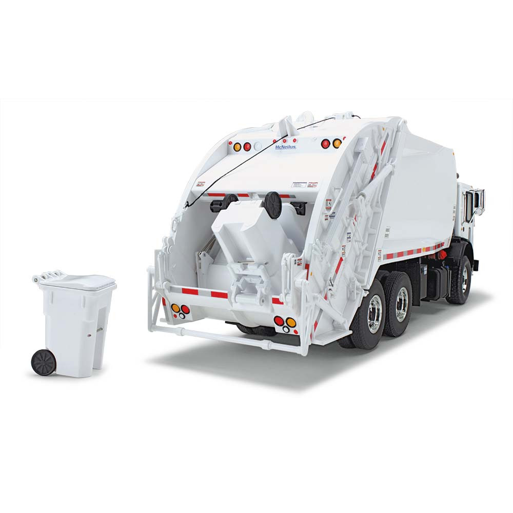 White Mack TerraPro with McNeilus Rear Loader Trash Carts