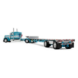 Teal Peterbilt Model 379 with 48" Flat Top Sleeper & Transcraft Step Deck Trailer Teal Peterbilt Model 379 with 48" Flat Top Sleeper & Transcraft Step Deck Trailer