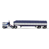 White/Blue Peterbilt Model 352 COE 110" Sleeper & 53' Wilson Roadbrute Flatbed Trailer with Covered Wagon White/Blue Peterbilt Model 352 COE 110" Sleeper & 53' Wilson Roadbrute Flatbed Trailer with Covered Wagon