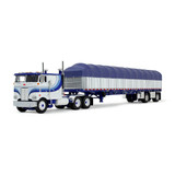 White/Blue Peterbilt Model 352 COE 110" Sleeper & 53' Wilson Roadbrute Flatbed Trailer with Covered Wagon
