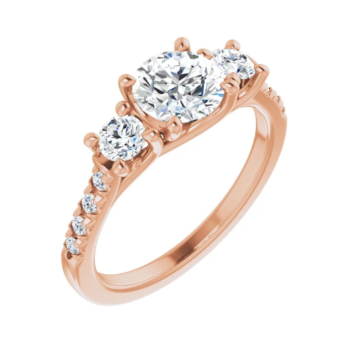 Rose gold three stone diamond accent French-set engagement ring
