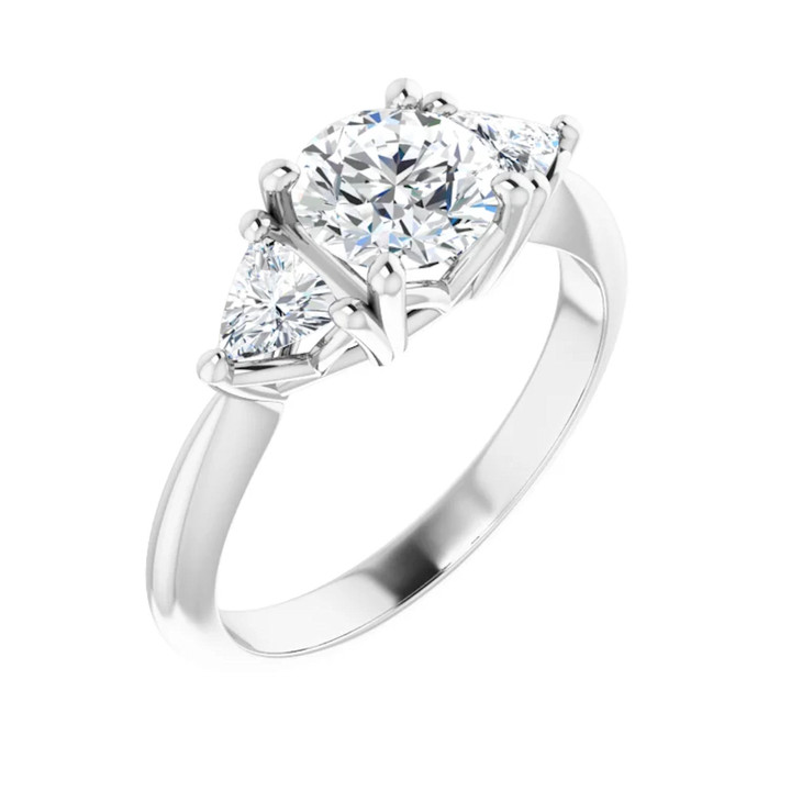 White gold trillion and round three stone diamond engagement ring