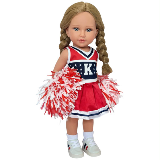 **Image Alt Text**

Celestine Camilleri, a blonde 18-inch Kennedy and Friends doll, wearing a red, white and navy cheerleader outfit with matching pom-poms and sneakers.