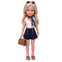 Solange Moreau, a 32 cm Evia's World™ doll from Corsica, featuring long blonde hair and bright blue eyes. She wears an ivory designer sleeveless top with bra padding, a navy skort with decorative gold buttons, a navy striped neck scarf, brown sandals, and carries a coordinating designer handbag. Sunglasses rest atop her hair, completing her chic Mediterranean-inspired look.