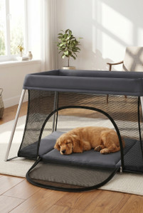 Aira's Nest™ dog retreat in dark gray with a golden retriever resting inside on the soft padded mat.
