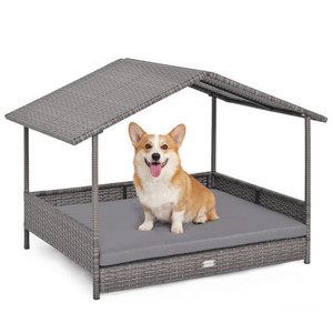 5 Star Pets elevated wicker dog house in gray with protective canopy and cushioned bed.