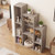 5 Star Pets gray cat tree bookshelf styled in a modern living room with cat accessories inside.