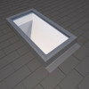 ECL 4646 0000C flashing integrated with a curb mount skylight on a shingle roof.