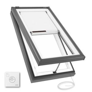 VCE 2246 skylight in open position, showing solar panel for operation and included wireless remote for venting control. VCE 2246 skylight in open position, showing solar panel for operation and included wireless remote for venting control.