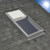 The VELUX VCE 2230 installed on a typical curb mount setup on a roof. This illustrates the installation method and its integration with the roofline. The VELUX VCE 2230 installed on a typical curb mount setup on a roof. This illustrates the installation method and its integration with the roofline.