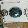 Bisbee spiderweb Turquoise oval cabochon