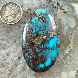 Excellent smoky Bisbee Turquoise with chocolate brown and quartz matrix Excellent smoky Bisbee Turquoise with chocolate brown and quartz matrix