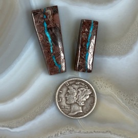 Bisbee Ribbon Turquoise Cabochon Pair. Bisbee Ribbon Turquoise Cabochon Pair.