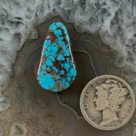 A colorful red spiderweb Bisbee Cabochon A colorful red spiderweb Bisbee Cabochon
