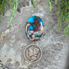 Royal blue Bisbee Turquoise in quartz with chocolate webbing Royal blue Bisbee Turquoise in quartz with chocolate webbing