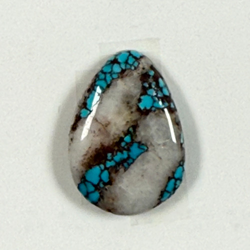 Red Web Bisbee in Quartz Cabochon
