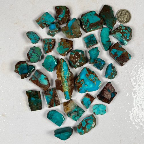 Authentic Bisbee Turquoise Rough for cutting Bisbee Turquoise Cabs, Bisbee Turquoise Beads, Bisbee Turquoise Gemstones, Bisbee Turquoise Cabochons. We have Natural Bisbee Turquoise Rough for Bisbee Turquoise Collectors, Bisbee Turquoise Cutters, Bisbee Turquoise Jewelers & Native American Bisbee Turquoise Artists.
Bisbee Turquoise is a Rare Gemstone From Bisbee, Arizona. Bisbee Turquoise is famous worldwide for its extraordinary beauty and one of a kind character. John Hartman is the #1 authority on Bisbee Turquoise.