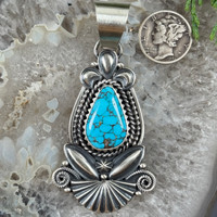 Spiderweb Bisbee Turquoise Pendant by Derrick Gordon