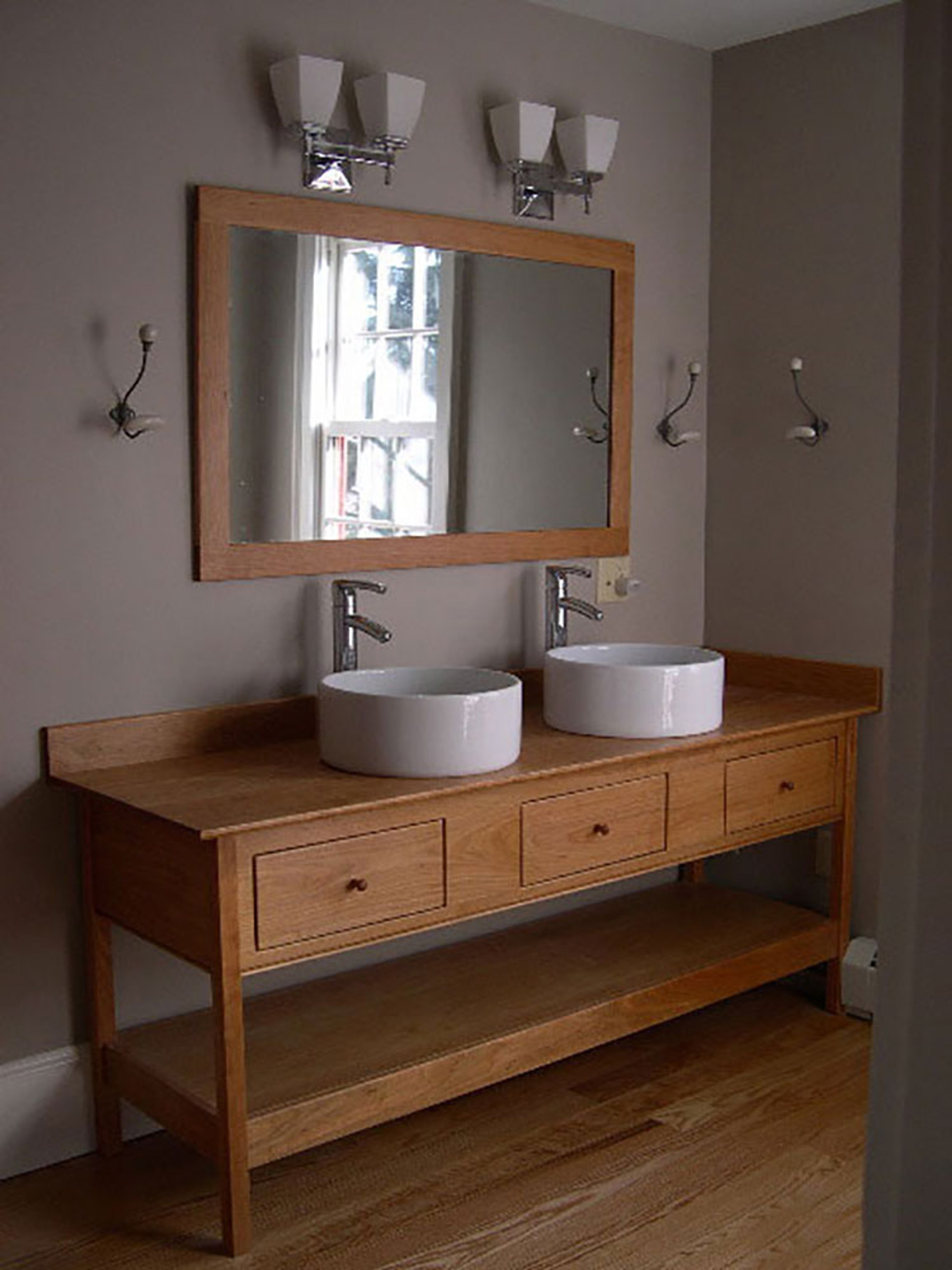 Open Style Vanity with double vessel sinks and 3 functional drawers