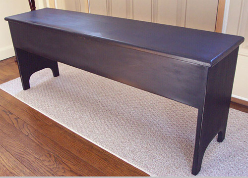 Our Shaker styled storage bench in poplar, shown painted black, with a 5" deep storage box.