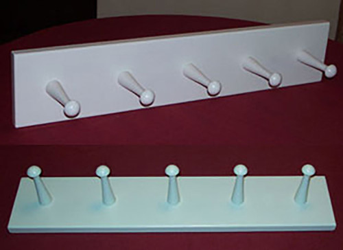 Standard Heavy Duty peg racks, large and strong, with Shaker pegs evenly spaced every six inches.