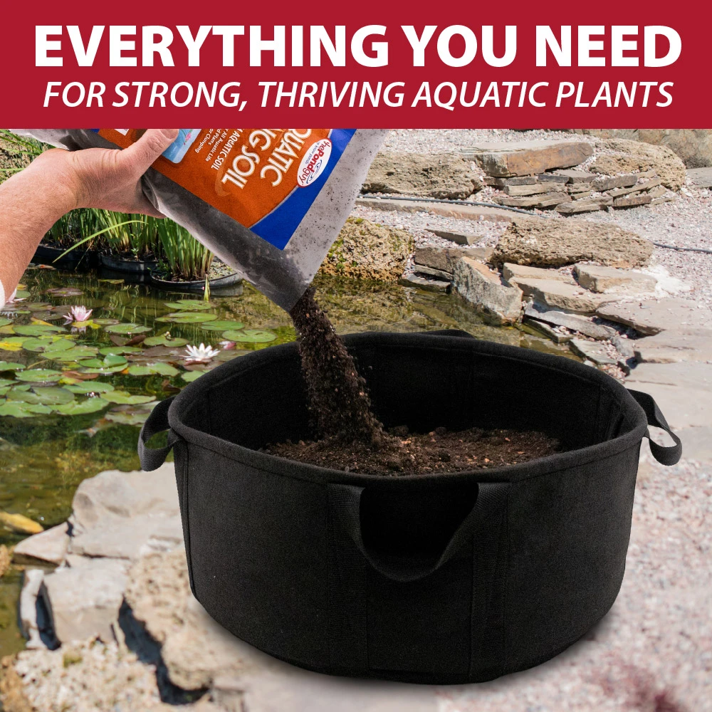 Aquatic planting soil being poured into a fabric planter bag beside a pond, showing everything needed to grow healthy aquatic plants.