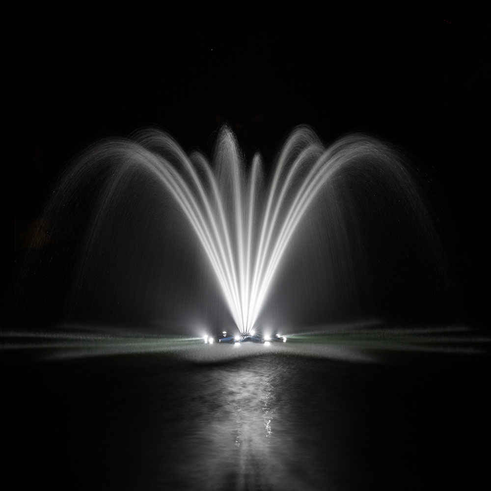 Airmax 2 HP PondSeries Fountain - Single Arch Nozzle at Night - Fountain Not Included
