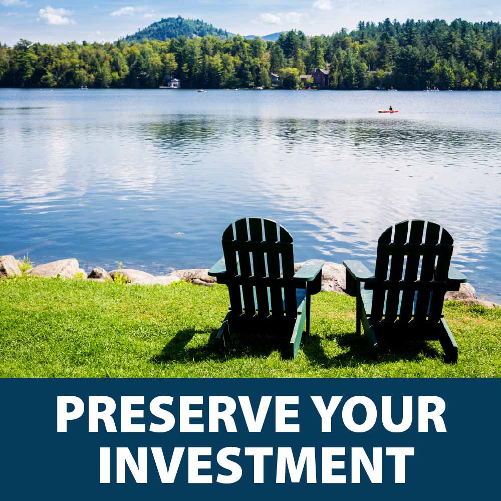 Two Adirondack chairs set next to a large, tree-lined lakeside, with text: “Preserve your investment”.
