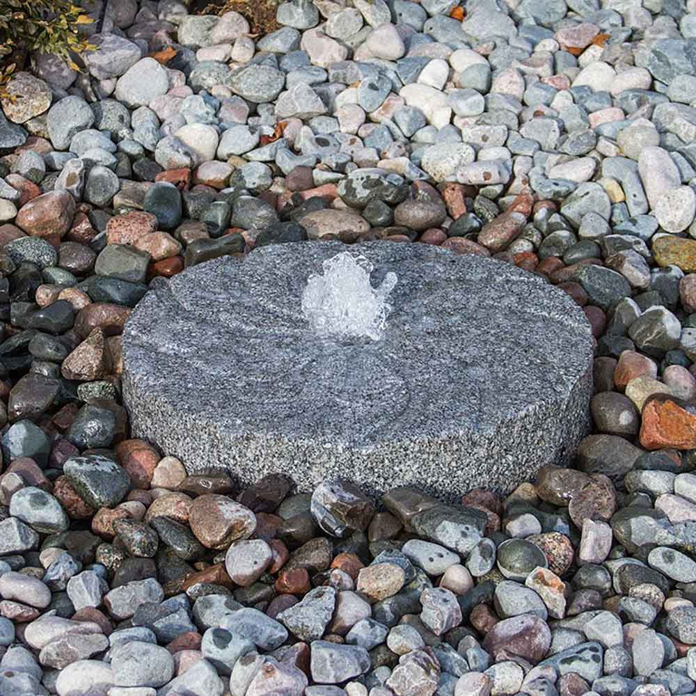 Blue Thumb Swirl Millstone Fountain Kit Shown With Mixed Pebbles