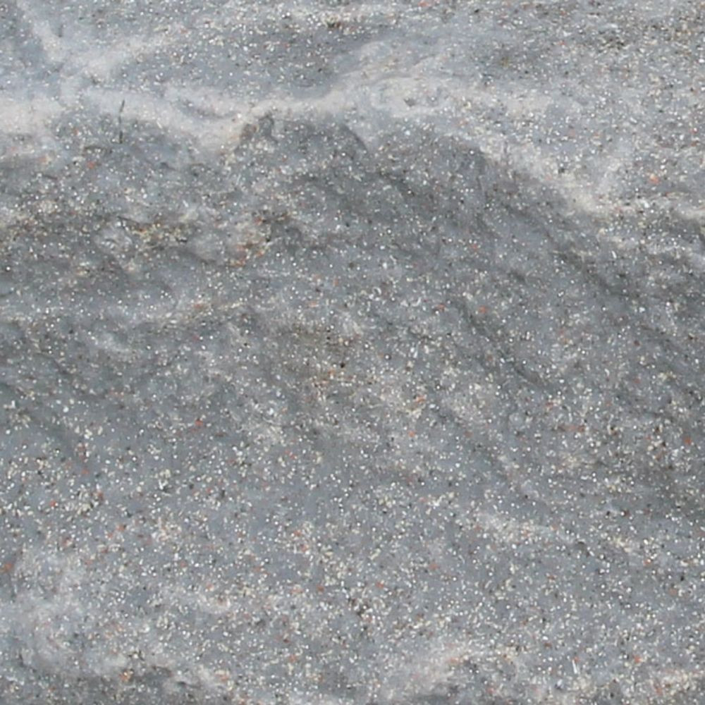 Close-up of DekoRRa’s Fieldstone faux rock texture, featuring gray tones and realistic details for seamless outdoor utility concealment.