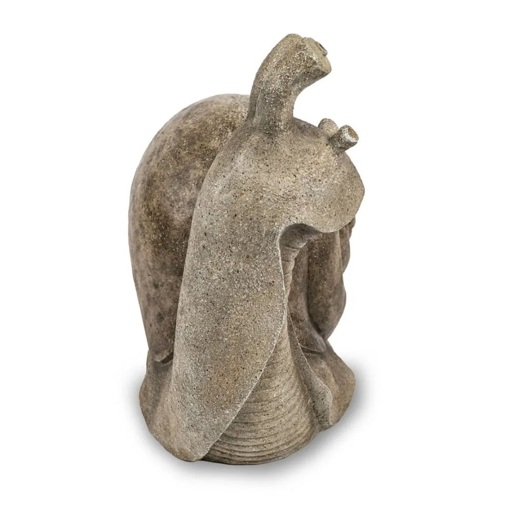 Side profile of the Silly Snail Spitter showing extended neck, curved body, and shell detail with lifelike stone finish ideal for outdoor décor.
