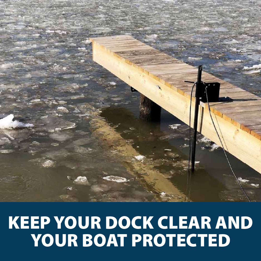 A narrow dock equipped with a mounted Ice Eater surrounded by broken ice chunks, with text: “Keep your dock clear and your boat protected”.