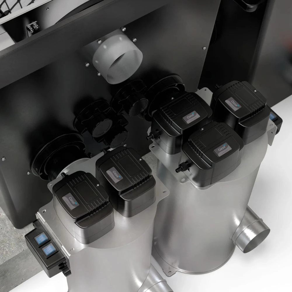 Integrated Oase Bitron Premium UV clarifiers connected to ProfiClear Premium XL pump-fed pond filter for enhanced water clarity and algae control.