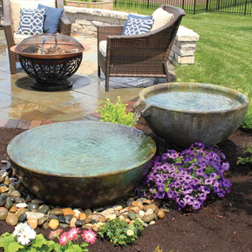Aquascape Spillway Bowl and Basin Landscape Fountain Kit Next to Patio View Product Image