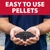 Close-up of black activated carbon pellets held in two hands, showing the easy-to-use pellet form used for pond water clarification. View Product Image