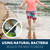 A child running through a clean pond with an inset image of a crossed-out backhoe & the bottom text “Using Natural Bacteria Reduces the Need to Dredge”. View Product Image