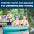 A family in a canoe with the top text “Treated Water Can Be Used for Swimming and Fishing”. View Product Image