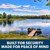An expansive, tree-lined lake with a stately dock, labeled: “Build for security, made for peace of mind”. View Product Image