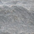 Close-up of DekoRRa’s Fieldstone faux rock texture, featuring gray tones and realistic details for seamless outdoor utility concealment. View Product Image