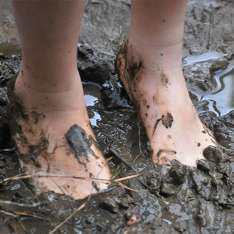 Feet Stuck in Pond Muck in Swimming Area