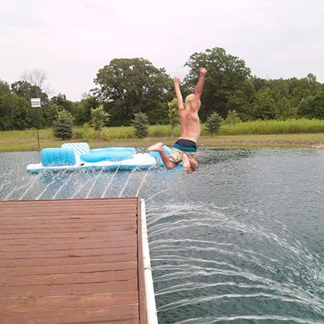 A friend suggested I use pond dye. I'm nervous because we swim in the pond. Is it safe, and which one do I use?