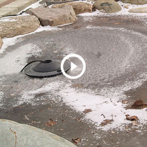 I have a de-icer but my pond totally froze over. Help! What do I do?