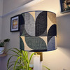 Retro blue lampshade in drum style and abstract fabric