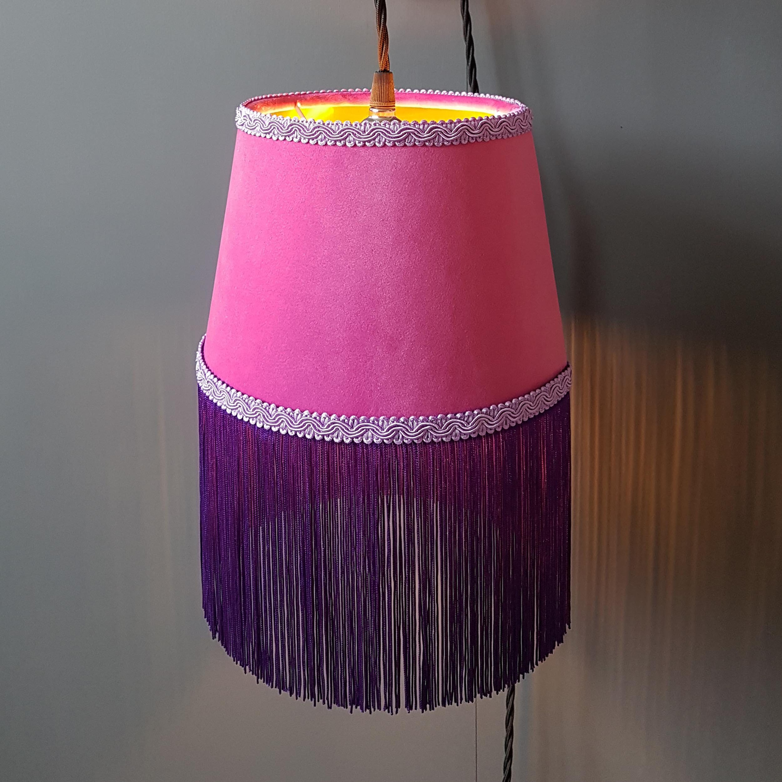 Luxury pink velvet lampshade with purple fringe and copper lining