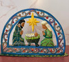 Arched nativity scene